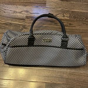 Jessica Simpson weekender with wheels.